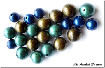 Peacock color polymer clay beads: The Beaded Bazaar